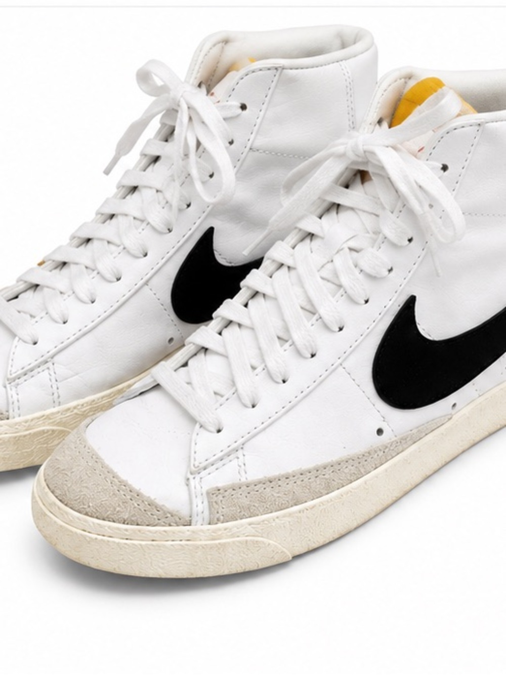 Nike White High-Top Sneakers with Black Swoosh and Tan Accents